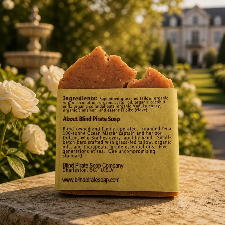 Oatmeal & Honey tallow soap bar, ingredients panel facing out, warm golden estate stable yard light. Blind Pirate Trading Co.