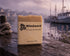 Windward tallow soap bar with label on wet dock, mooring rope, lavender, misty harbor at dusk. Blind Pirate Trading Co.