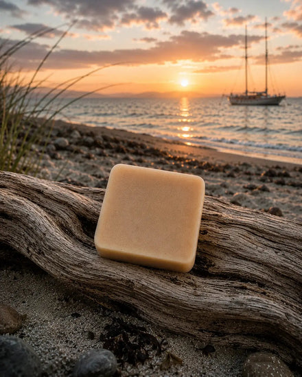 Passage bar on driftwood at sunset Sailor's Mead Passage shampoo bar on driftwood at sunset beach, Certified Grass-Fed Tallow, Blind Pirate Trading Co.