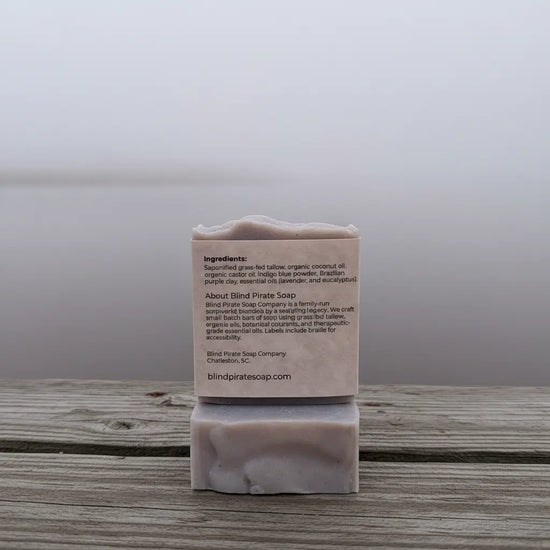 Windward | Back label ingredients listed. Soap on a weathered dock. Blind Pirate Trading Co.