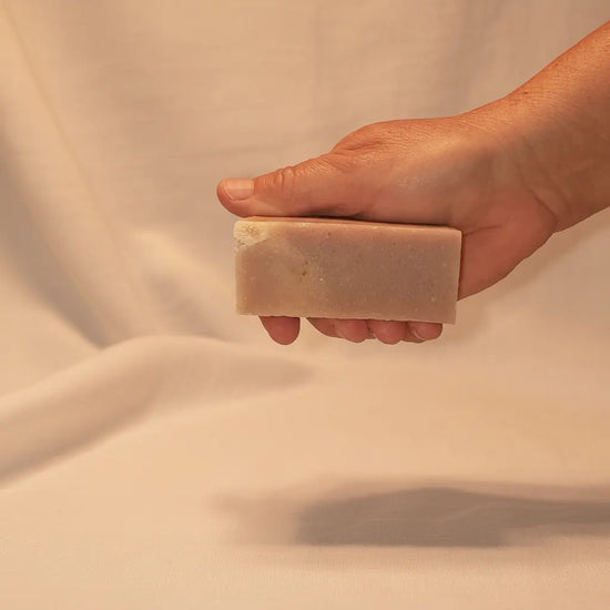 Ballast Bar cut Petals & Loam grass-fed tallow soap bar, soft blush pink with earthy flecks. Blind Pirate Trading Co.