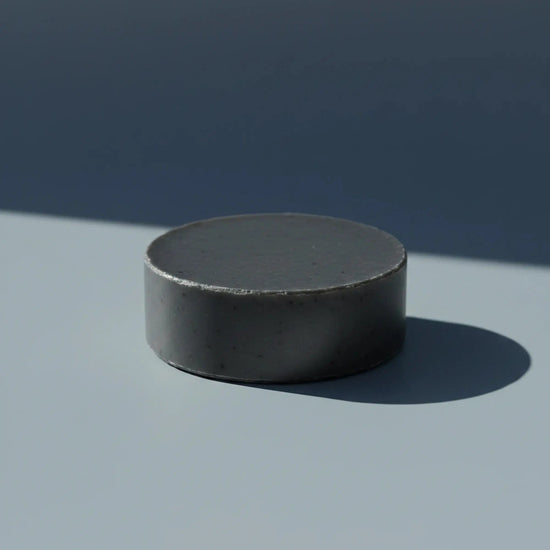 Salt & Timber | Grass Fed Tallow | Shampoo Bar Blind Pirate Trading Co. Gun metal gray round puc shampoo bar.