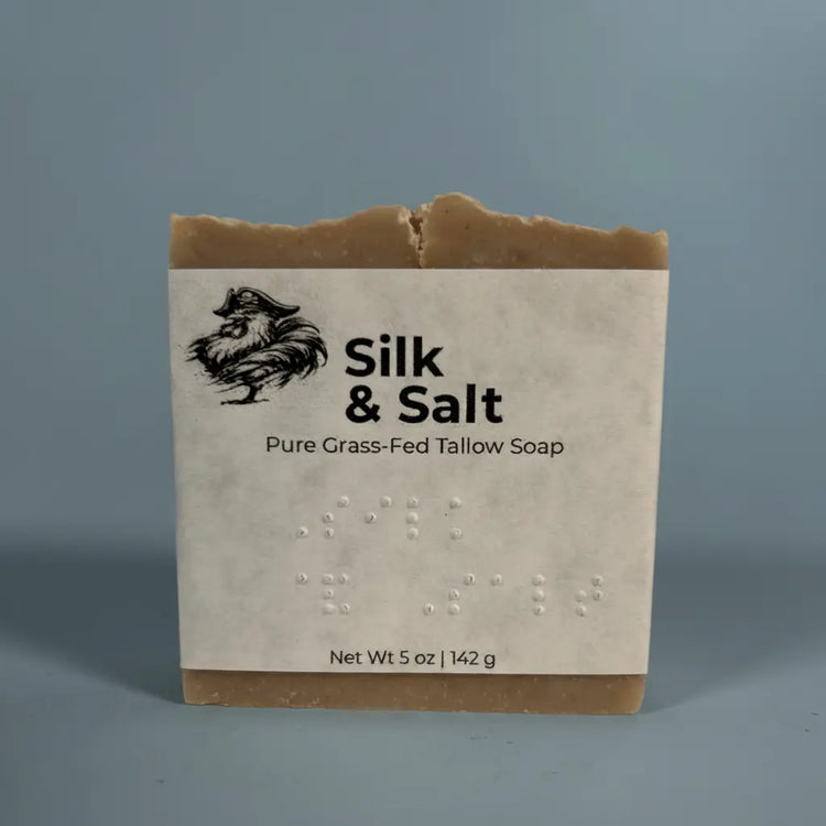 Silk & Salt — close up of the soap and the fully brailled label Silk & Salt