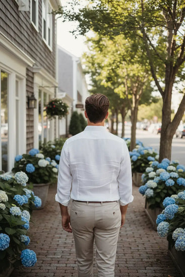 Village Walk along hydrangea sidewalk, with perfectly healthy hair.